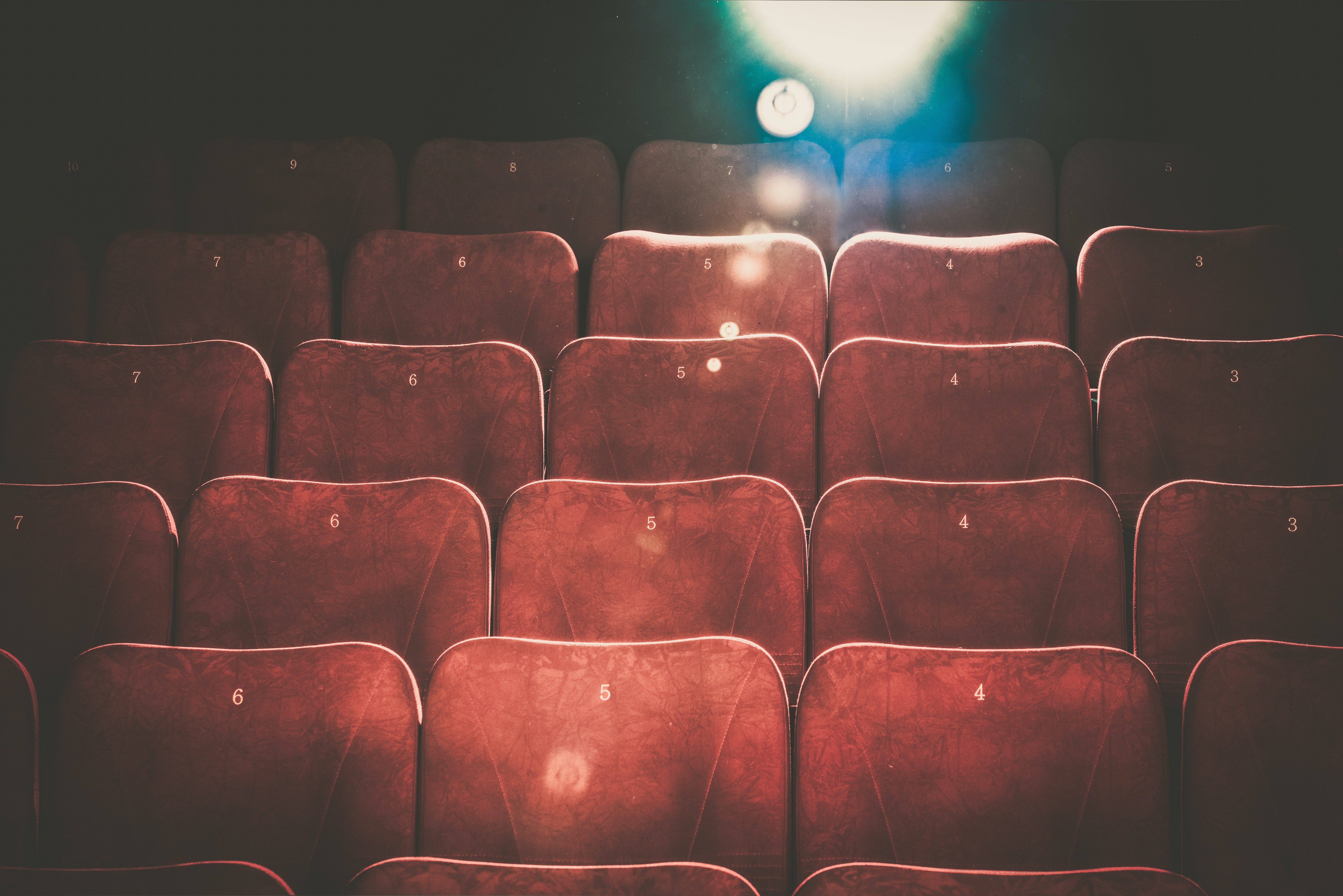 Empty cinema seats in a theatre.